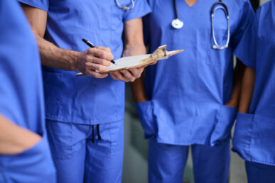 Group of NHS colleagues in Blue Scrubs