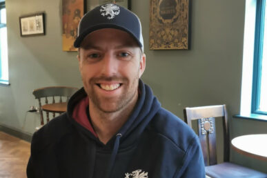 Cricketer Jack Leach sat in a coffee shop.
