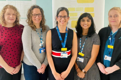 Stood left to right in a line are colleagues: Sadie Thomas, Emily King, Shabana Allsop, Anu Abraham, and Di Boothman