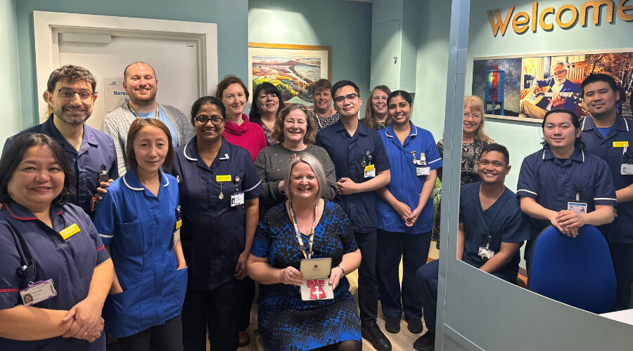 Associate director Trish Spruce collects MBE from Prince William